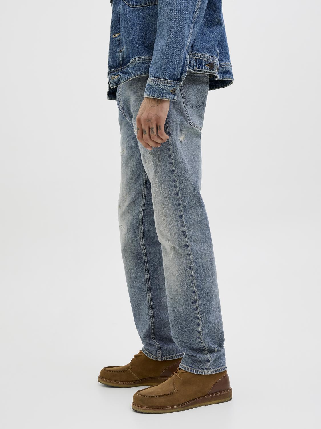 صورة جانبية لبنطال جينز رجالي أزرق